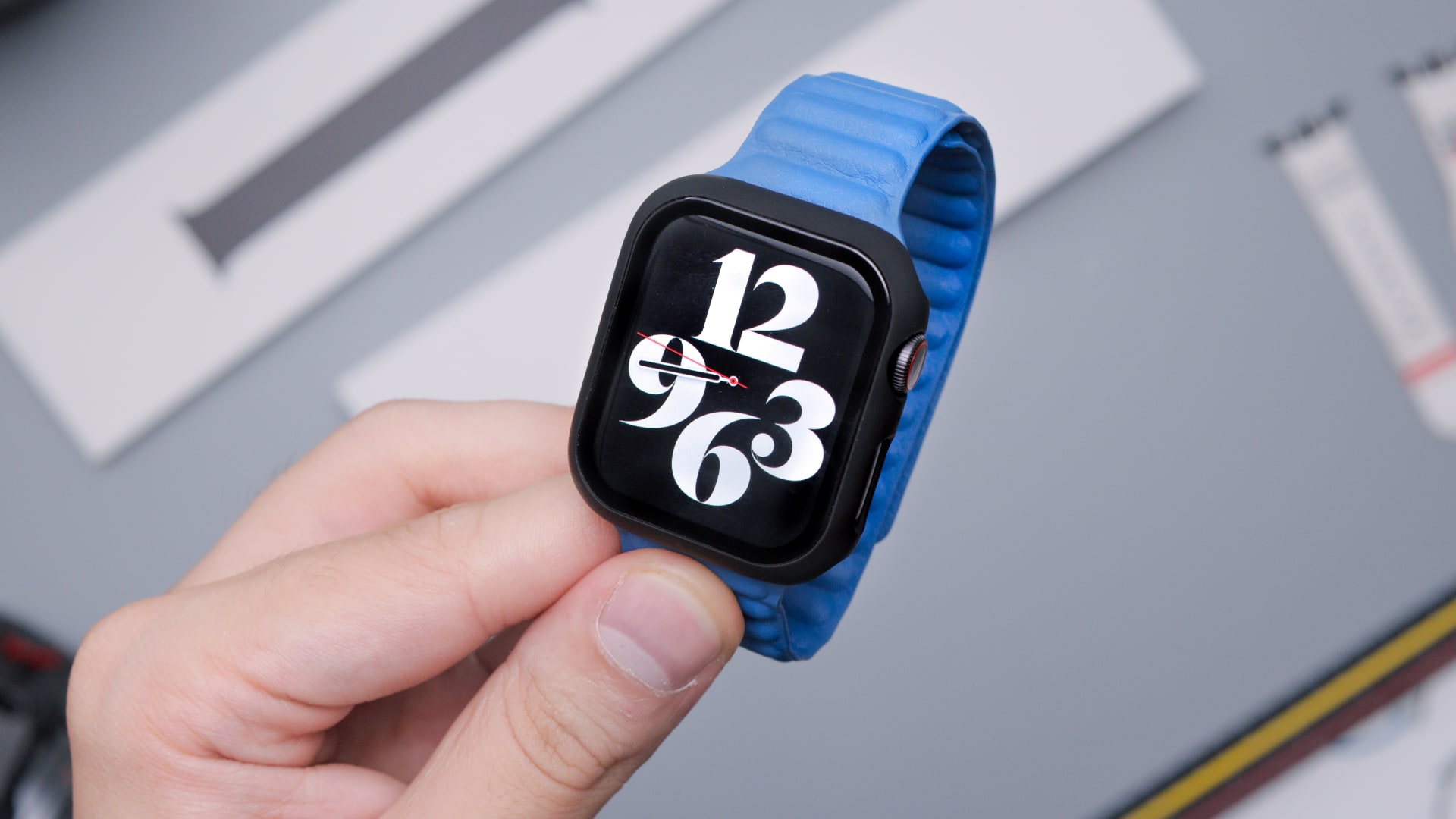 Apple Watch Series 7 with a blue band and case