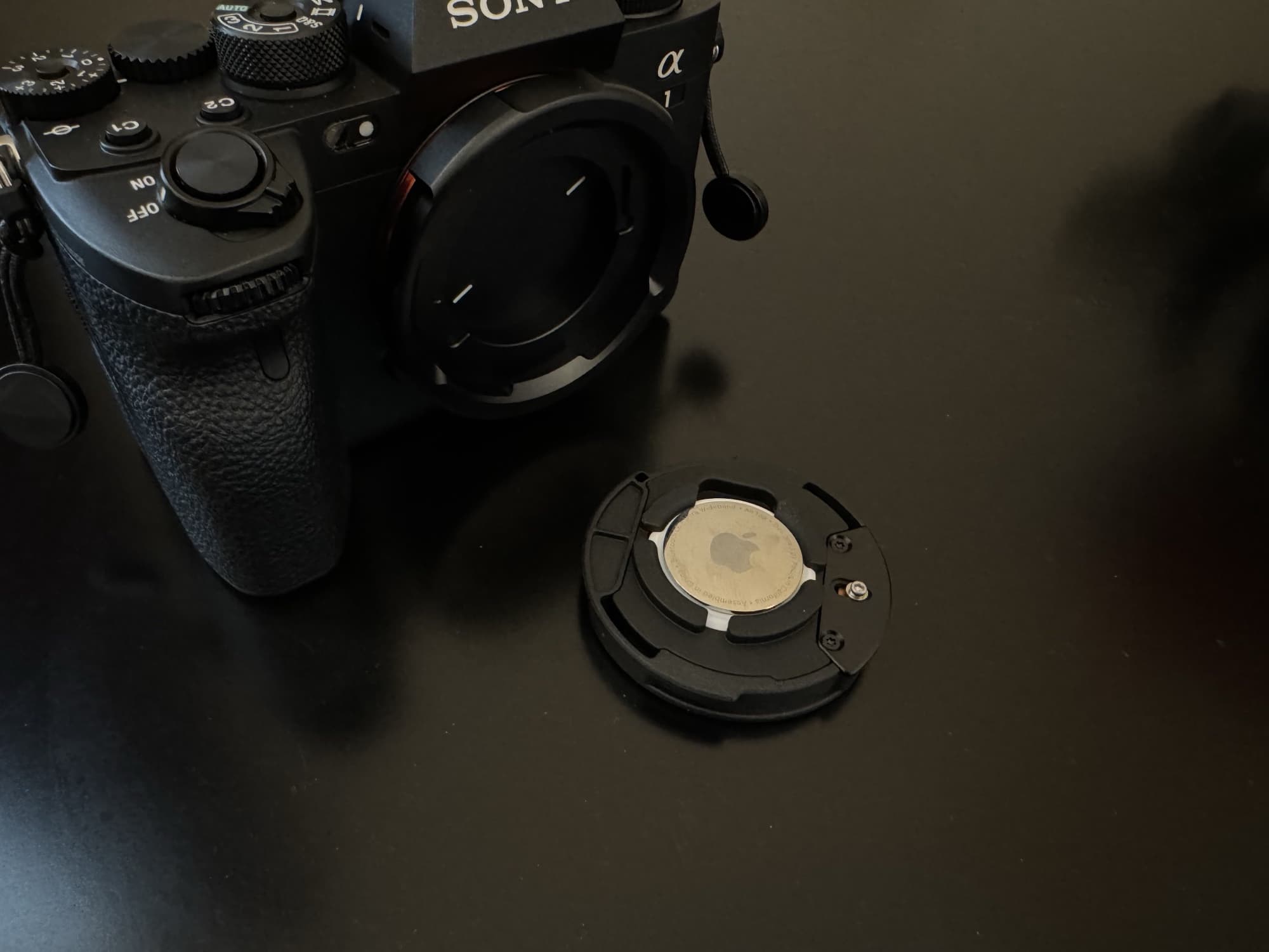 PolarPro Defender Pro Camera Body cap with AirTag storage.