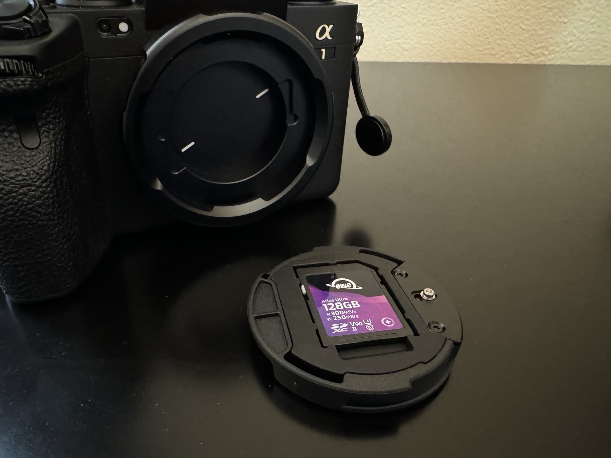 PolarPro Defender Pro camera body cap with SD Card insert.