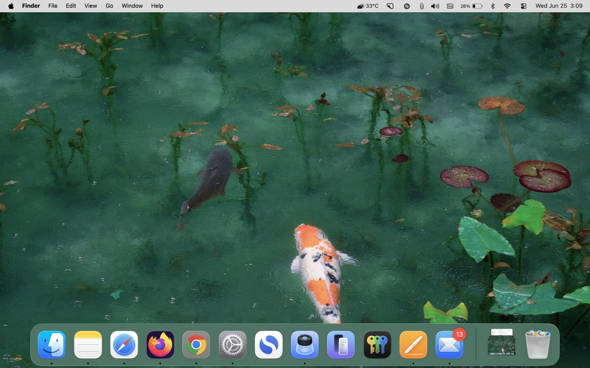 macOS Tahoe desktop with the menu bar showing a solid gray background.