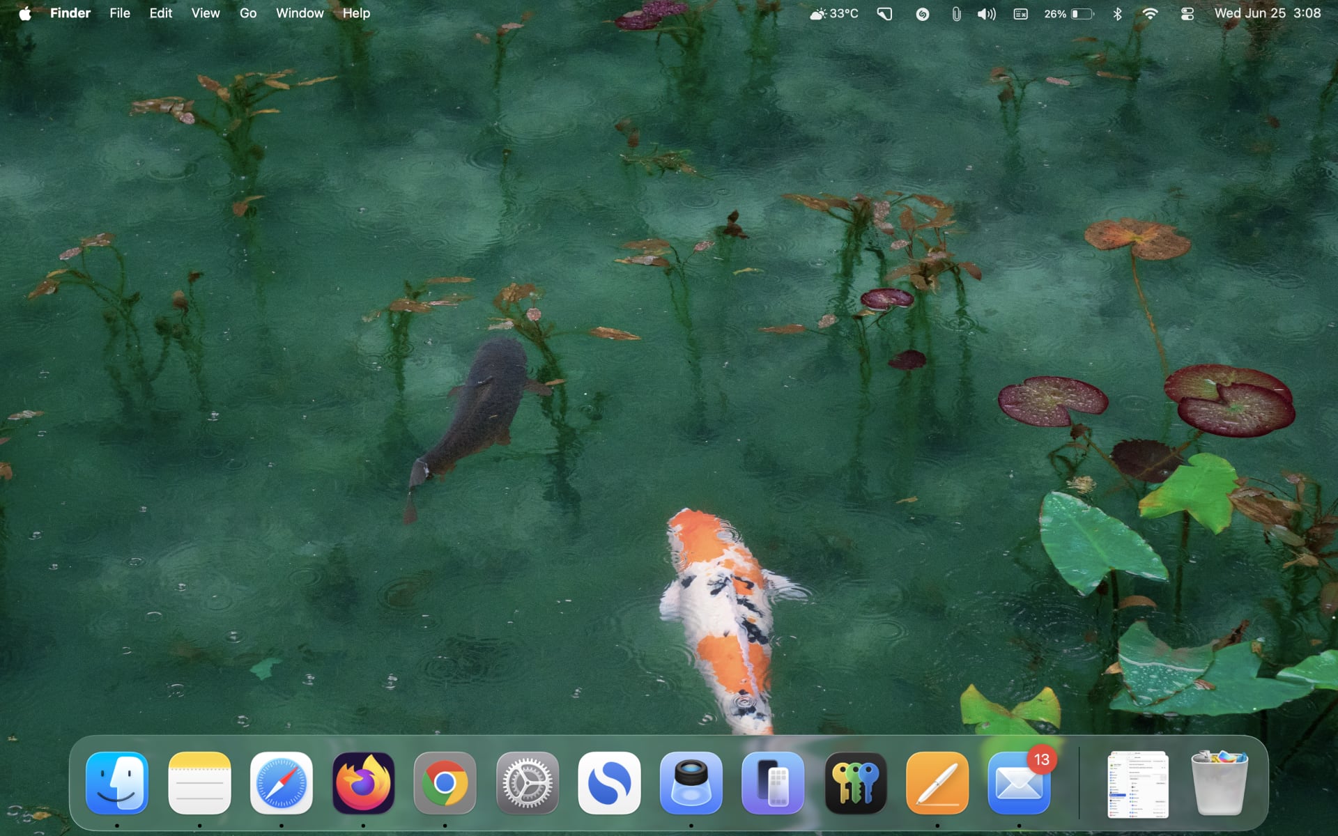 macOS Tahoe desktop with a transparent menu bar..